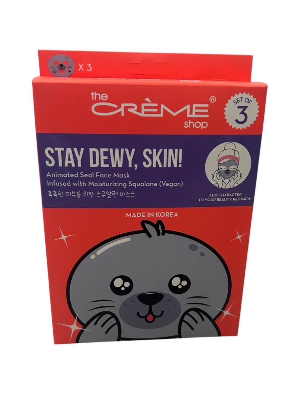the CRÈME shop Stay Dewy, Skin! Animated Seal Face Mask - Red & Purple Packaging